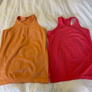 Athleta girls tank. Size L.  One bright orange and pink/red color.  Like new